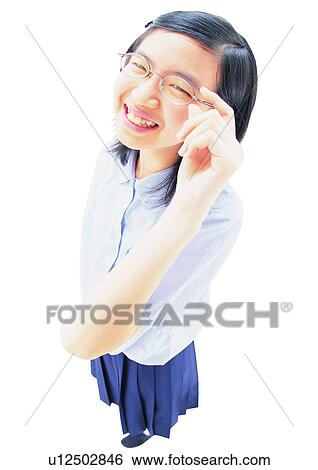 Stock Photograph - Gesturing, Posing, Lifestyles, Asian Expression, Standing, Asian, Asian Ethnicity. Fotosearch