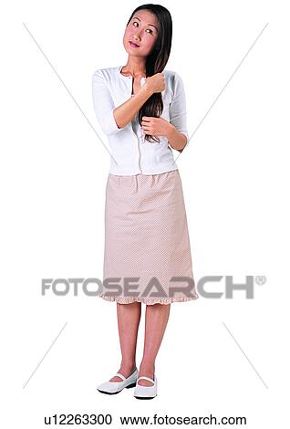 Stock Image - Long Hair, Black Hair, Young Adult, Posing. Fotosearch