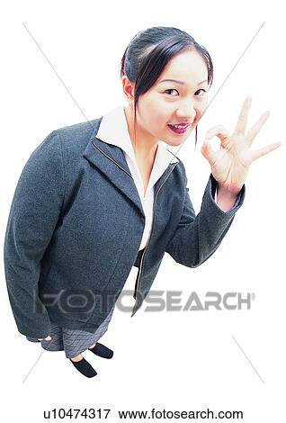 Stock Photo - Model, Gesture, Looking At Camera, Asian Expression, Posing. Fotosearch