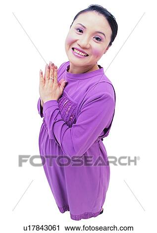 Stock Image - Model, Hands Clasped, Indoor, Pregnancy, Expression, One Person. Fotosearch