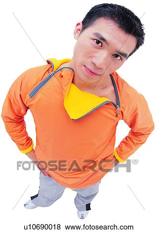 Stock Photo - One Young Man Only, Young Adult, Indoor, Looking At Camera. Fotosearch