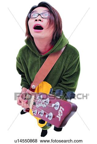 Stock Photo - White Background, Cut Out, Clipping Path, Lifestyles, Guitar. Fotosearch