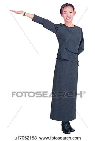 Stock Photo - Brown Hair, Smiling, Asian Ethnicity, Arm Raised, Standing, One Young Woman Only. Fotosearch