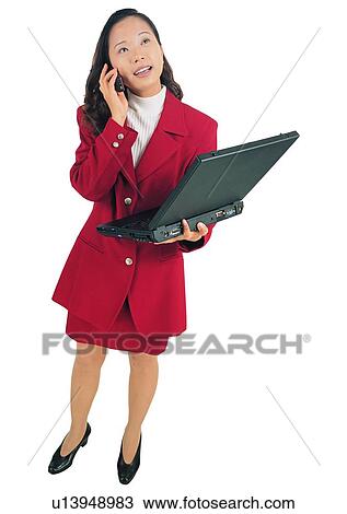 Stock Image - Indoor, White Background, Cut Out, Businesswoman, Young Adult, Lifestyles. Fotosearch
