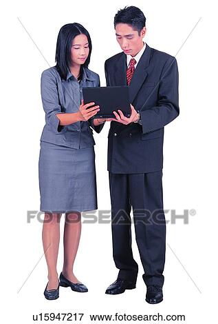 Stock Photo - Lifestyles, Formal Clothing, Indoor, Young Men, Adults Only, Laptop. Fotosearch