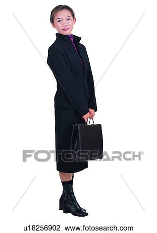Stock Image - Looking At Camera, Portrait, Lifestyles, One Person, Standing. Fotosearch