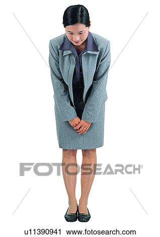Looking Down, Bending, Business Culture, Greeting, Businesswoman View Large Photo Image Stock Image - Looking Down, Bending, Business Culture, Greeting, Businesswoman. Fotosearch