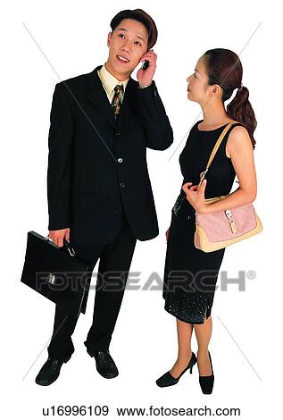 White Background, Young Men, Looking Up, On The Phone, Clipping Path View Large Photo Image Stock Photo - White Background, Young Men, Looking Up, On The Phone, Clipping Path. Fotosearch