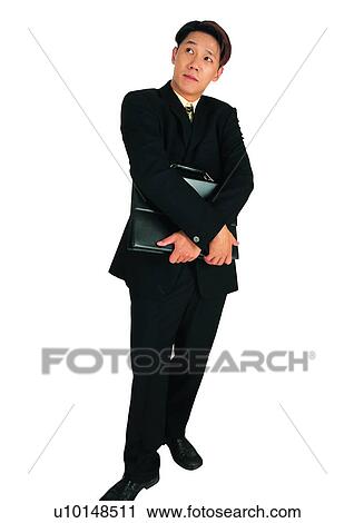 Stock Image - Young Adult, Asian Ethnicity, Work, White Background, Looking Up, Lifestyles. Fotosearch