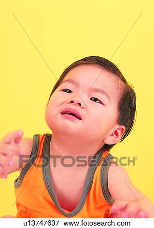 Stock Photo - baby, child, lovely, cute, standing, kid. Fotosearch