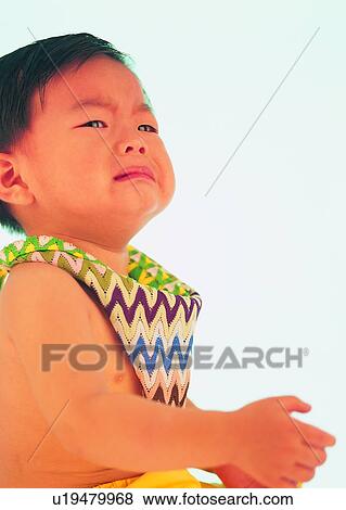 Stock Photo - boy, kid, toddler, cute, Asian, crying. Fotosearch