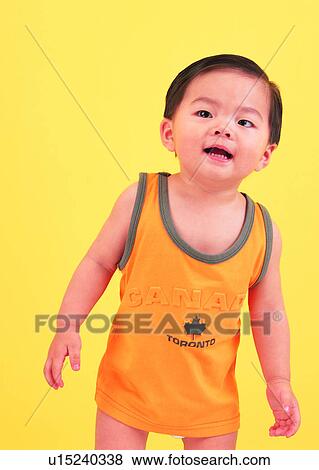 Stock Photo - child, baby, standing, Asian, toddler, kid. Fotosearch
