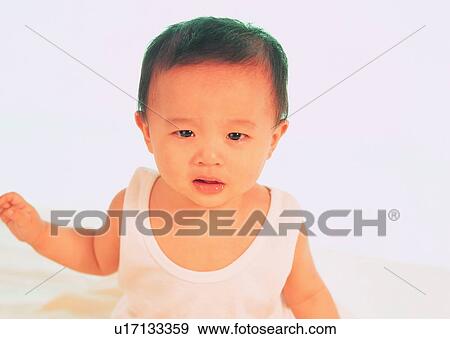 Stock Photo - child, lovely, Asian, boy, cute. Fotosearch