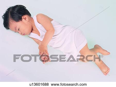 Stock Photo - lovely, kid, child, Asian, cute. Fotosearch
