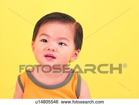Stock Photograph - standing, lovely, cute, kid, baby, Asian. Fotosearch