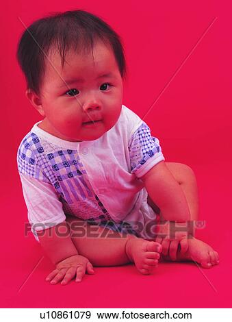 Stock Photo - toddler, kid, lovely, cute, sitting, boy. Fotosearch