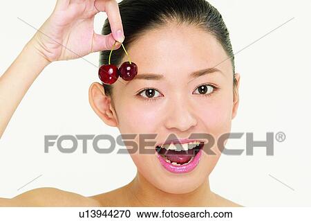Beauty And Fruits, Beauty & Fruits, Beauty, Black Hair, Cherry, Close-Up View Large Photo Image Stock Image - Beauty And Fruits, Beauty & Fruits, Beauty, Black Hair, Cherry, Close-Up. Fotosearch