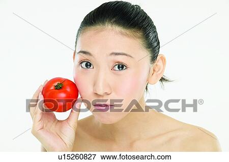 Stock Photo - Beauty And Fruits, Beauty & Fruits, Beauty, Black Hair, Close-Up. Fotosearch