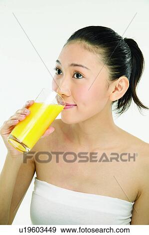 Stock Photo - Beauty And Fruits, Beauty & Fruits, Beauty, Black Hair, Close-Up. Fotosearch