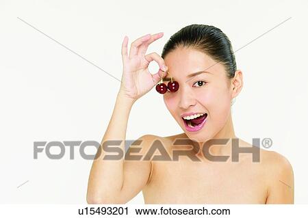 Stock Image - Beauty & Fruits, Beauty And Fruits, Looking At Camera, Smiling, Beauty, Mouth Open. Fotosearch