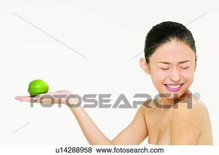 Stock Photo - Beauty, Happiness, Beauty & Fruits, White Background, Fruit, Young Adult. Fotosearch