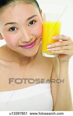Black Hair, Asian, Beauty And Fruits, Healthy Eating, Young Adult, Glass View Large Photo Image Stock Image - Black Hair, Asian, Beauty And Fruits, Healthy Eating, Young Adult, Glass. Fotosearch