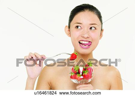 Picture - Black Hair, Looking Away, Fruit, Beauty And Fruits, Healthy Eating. Fotosearch