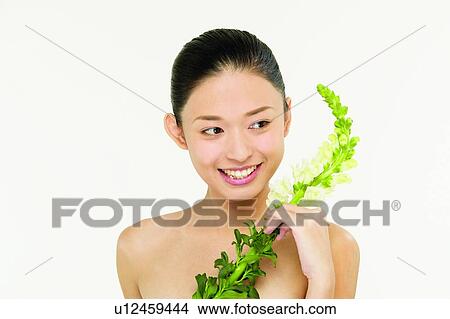 Flower, Black Hair, Beauty & Fruits, Hair Back, Looking Away View Large Photo Image Picture - Flower, Black Hair, Beauty & Fruits, Hair Back, Looking Away. Fotosearch
