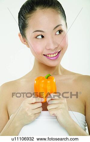 Stock Image - Freshness, Close-Up, Tube Top, Beauty And Fruits, Young Adult, Healthy Eating. Fotosearch