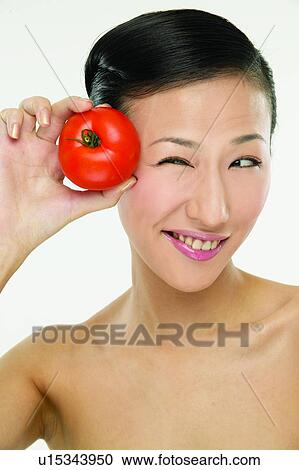 Stock Image - Fruits, One Person, Smiling. Fotosearch
