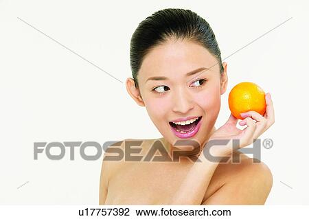Stock Image - Hair Back, One Person, Beauty, Healthy Eating, Freshness, Fruits. Fotosearch