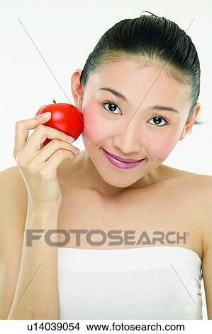 Looking At Camera, One Young Woman Only, Vegetable, Fruits, Food And Drink View Large Photo Image Picture - Looking At Camera, One Young Woman Only, Vegetable, Fruits, Food And Drink. Fotosearch