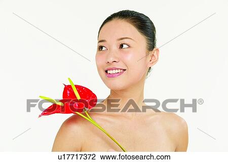 Stock Image - Red, Looking Away, Fruits, Flower, Indoor. Fotosearch