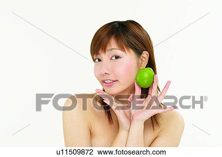 Stock Image - Toothy Smile, White Background, Close-Up, Bangs, Asian, Indoor. Fotosearch