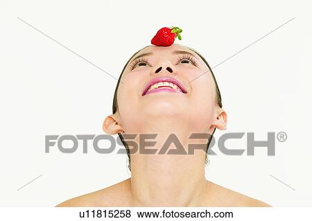 Stock Photo - Young Adult, Toothy Smile, Fruits. Fotosearch