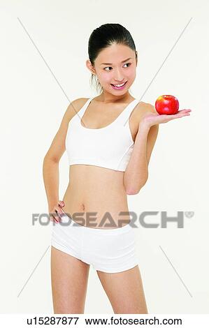 Black Hair, Apple, Beauty Sports, Beauty, Asian Ethnicity, 18-19 Years View Large Photo Image Stock Photo - Black Hair, Apple, Beauty Sports, Beauty, Asian Ethnicity, 18-19 Years. Fotosearch