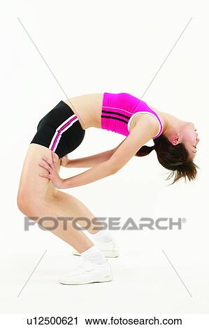 Stock Image - Brown Hair, Beauty, Bending Over Backwards, Bending, Beauty Sports, Asian Ethnicity. Fotosearch