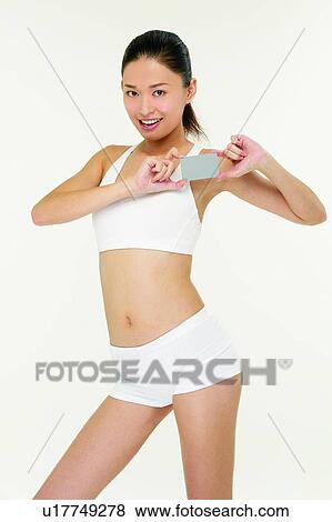 Communication, Sports Bra, One Person, Looking At Camera, Portrait, Holding View Large Photo Image Stock Photo - Communication, Sports Bra, One Person, Looking At Camera, Portrait, Holding. Fotosearch