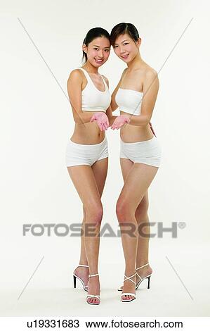 Confidence, Indoor, Friendship, Portrait, Young Women View Large Photo Image Stock Image - Confidence, Indoor, Friendship, Portrait, Young Women. Fotosearch