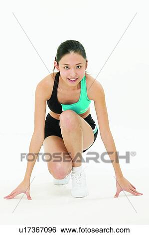 East, Confidence, Smiling, Crouching, Sports Bra View Large Photo Image Stock Photograph - East, Confidence, Smiling, Crouching, Sports Bra. Fotosearch