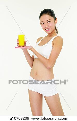 Glass, Asian Ethnicity, Three-Quarter Length, Smiling, 18-19 Years View Large Photo Image Stock Photo - Glass, Asian Ethnicity, Three-Quarter Length, Smiling, 18-19 Years. Fotosearch