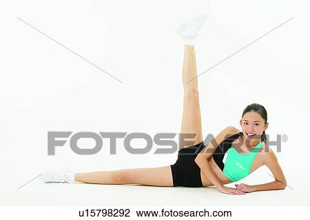 Stock Image - One Person, Black Hair, Lying On Side, Asian Ethnicity, 18-19 Years. Fotosearch