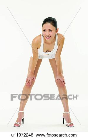 Stock Photo - One Person, High Heels, Indoor, One Young Woman Only, Sports. Fotosearch