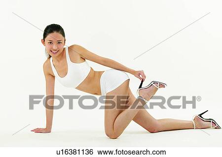 Sports, High Heels, Beauty Sports, Sports Bra, Looking At Camera View Large Photo Image Stock Photograph - Sports, High Heels, Beauty Sports, Sports Bra, Looking At Camera. Fotosearch