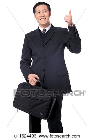 Stock Image - business executive, success, culture, fashion, male, business attitudes. Fotosearch