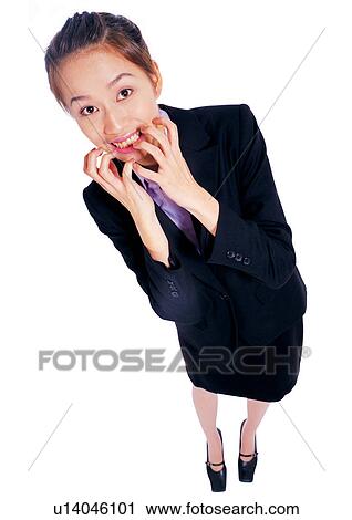 Stock Image - human cut outs, asian, bending, business. Fotosearch