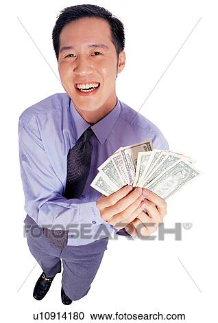 Stock Image - lifestyle, profession, asian, money, button down shirt, business. Fotosearch