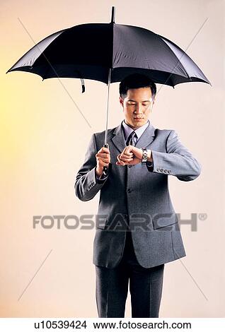 Picture - occupation, fashion, waiting, safety, well dressed, profession, protection. Fotosearch
