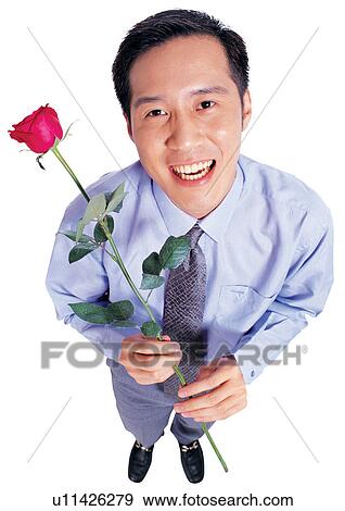 Stock Photo - occupation, human cut outs, flower, one person, man only, tie, asian. Fotosearch