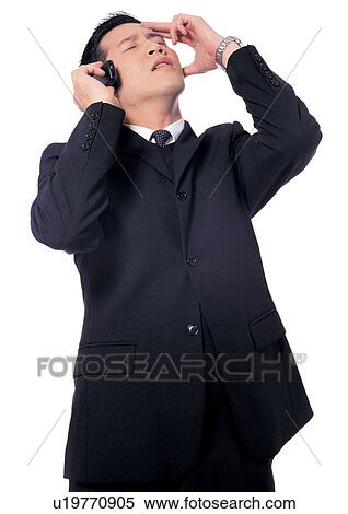 profession, suit, asian, mobile phone, pain, man only View Large Photo Image Stock Photography - profession, suit, asian, mobile phone, pain, man only. Fotosearch